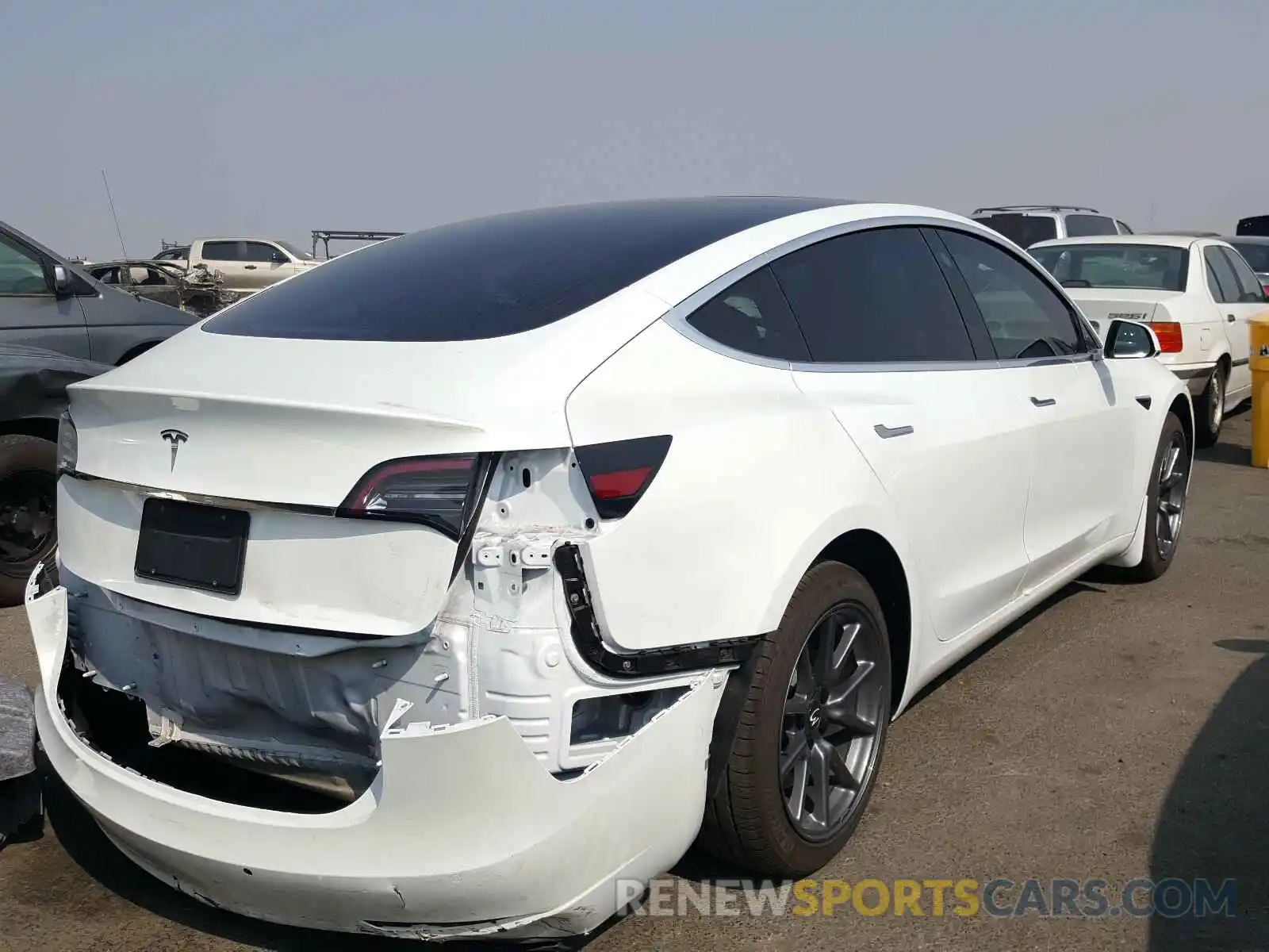 4 Photograph of a damaged car 5YJ3E1EA0LF632749 TESLA MODEL 3 2020