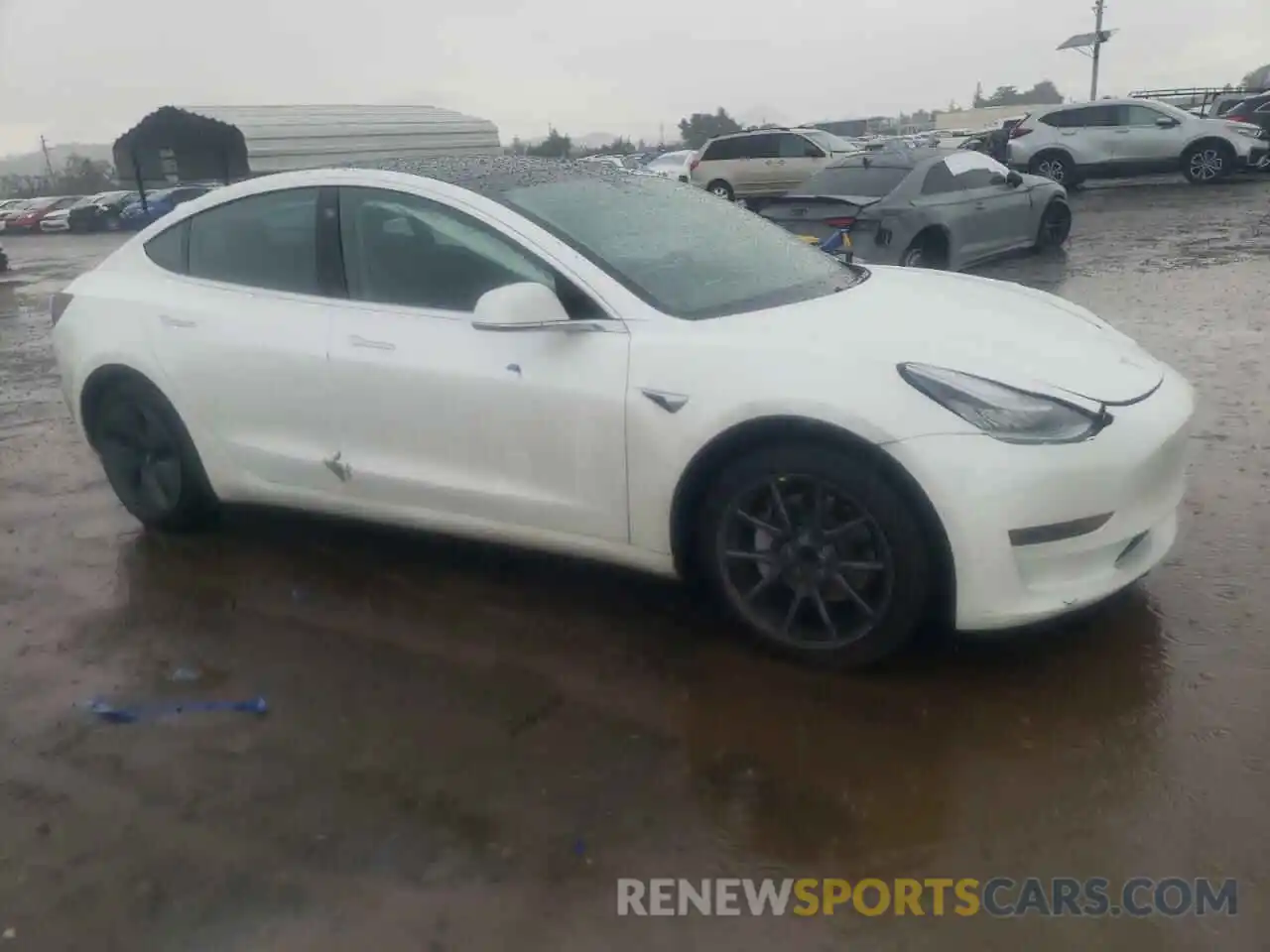 4 Photograph of a damaged car 5YJ3E1EA0LF632881 TESLA MODEL 3 2020