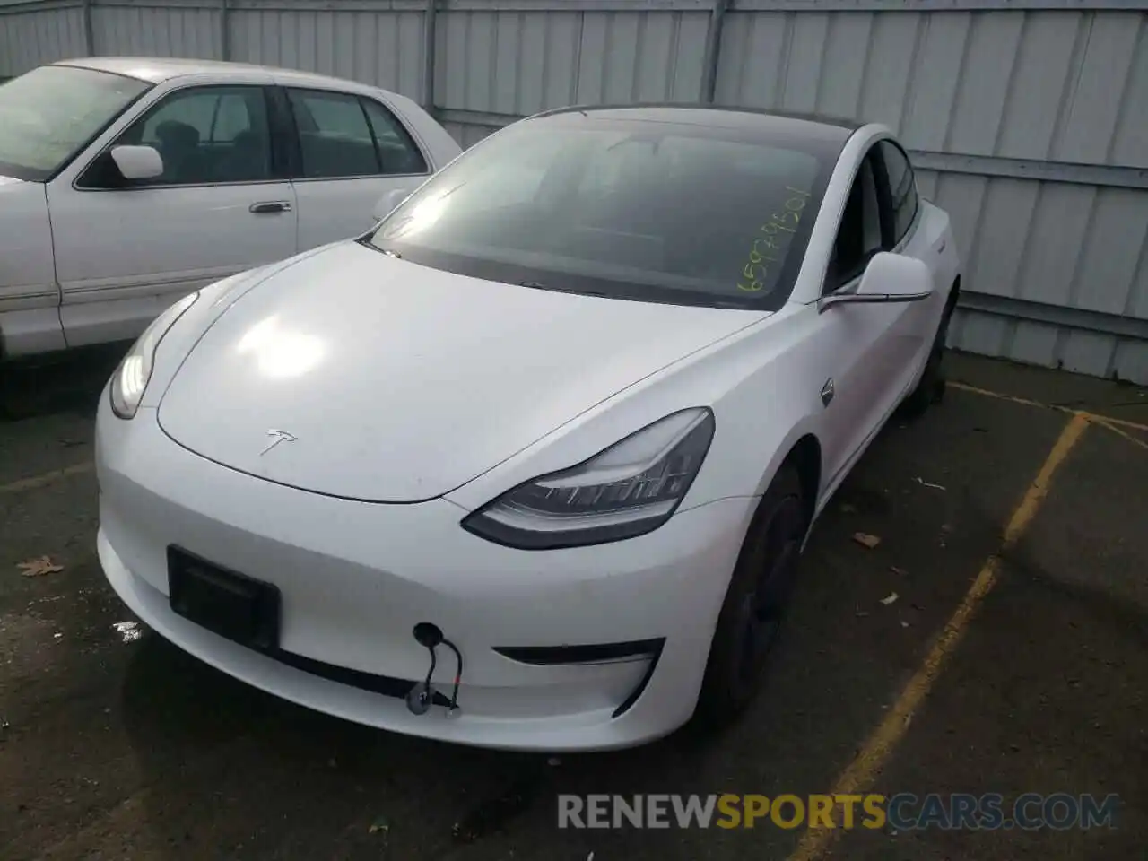 2 Photograph of a damaged car 5YJ3E1EA0LF634078 TESLA MODEL 3 2020