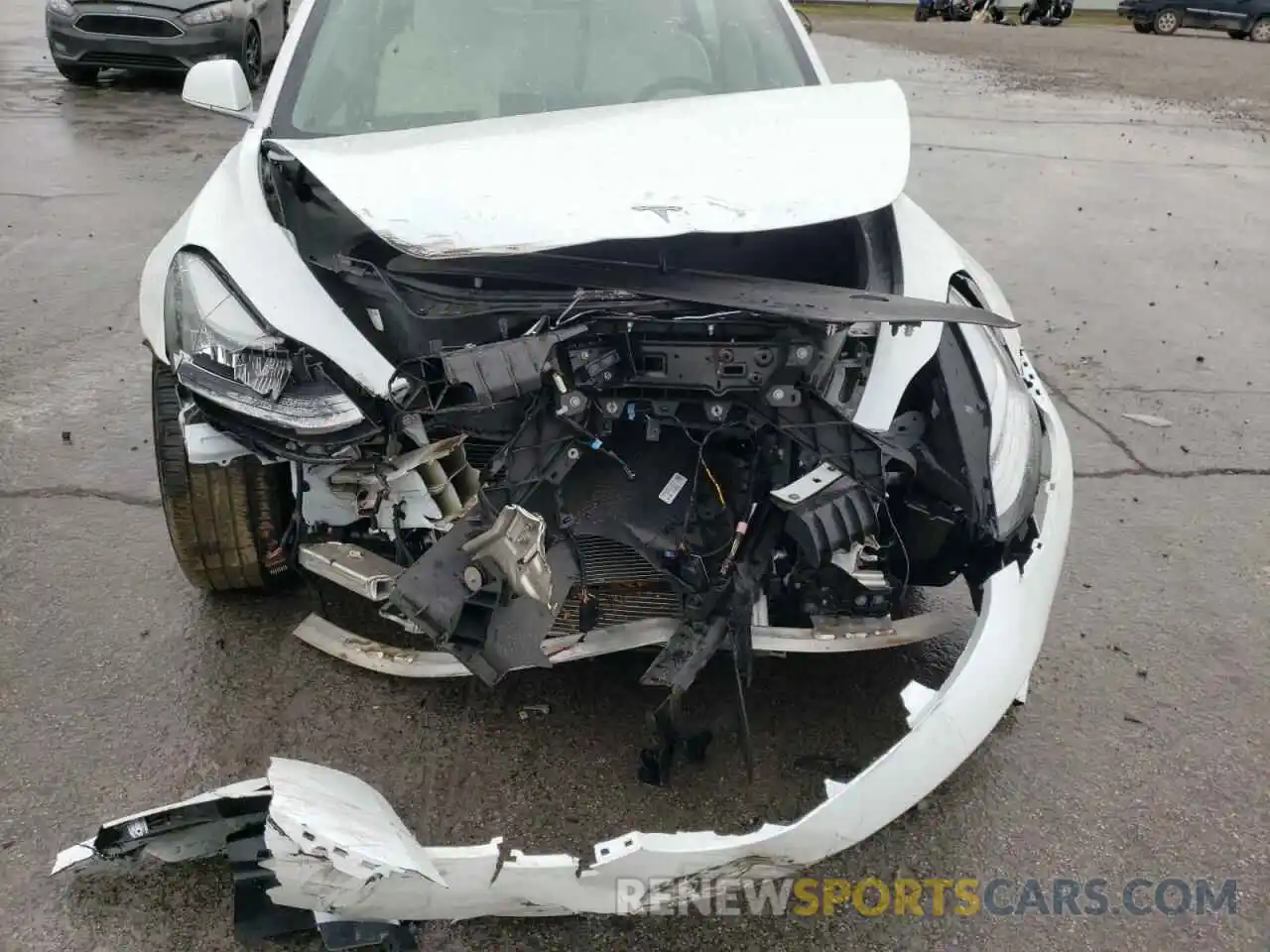 9 Photograph of a damaged car 5YJ3E1EA0LF634713 TESLA MODEL 3 2020