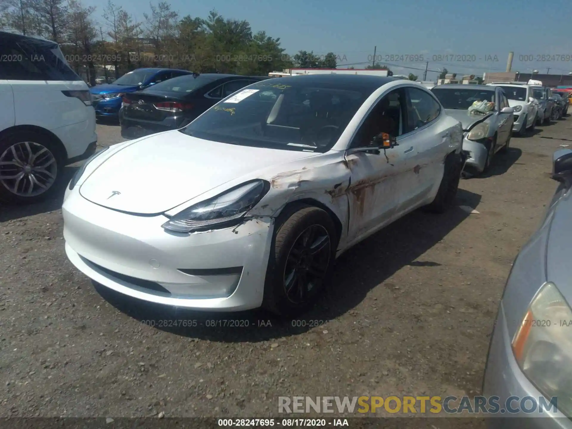 2 Photograph of a damaged car 5YJ3E1EA0LF634940 TESLA MODEL 3 2020