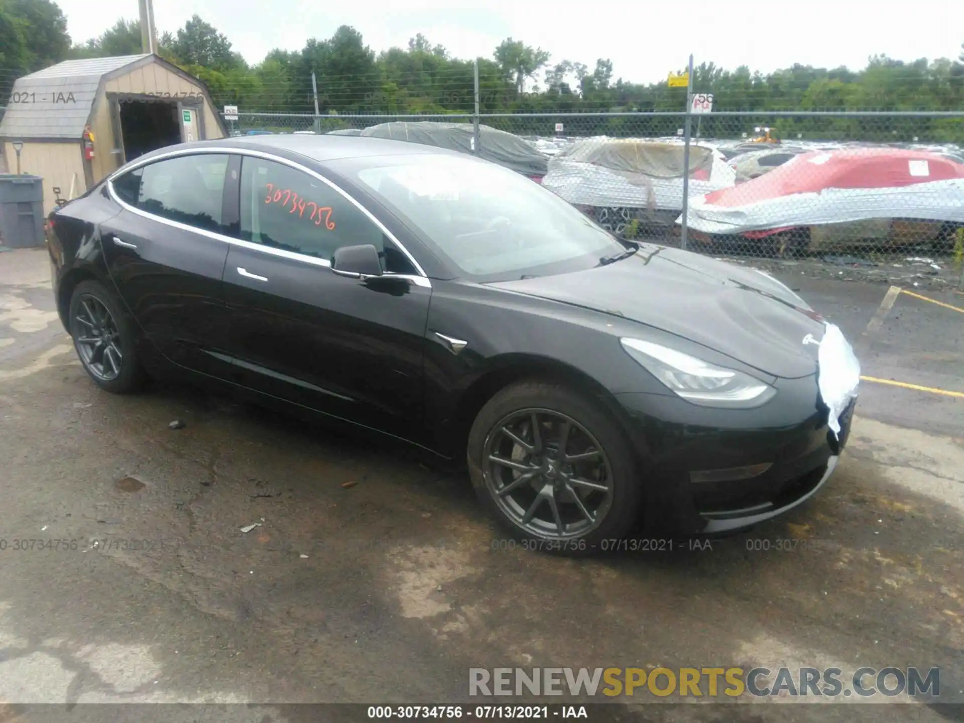 1 Photograph of a damaged car 5YJ3E1EA0LF657456 TESLA MODEL 3 2020