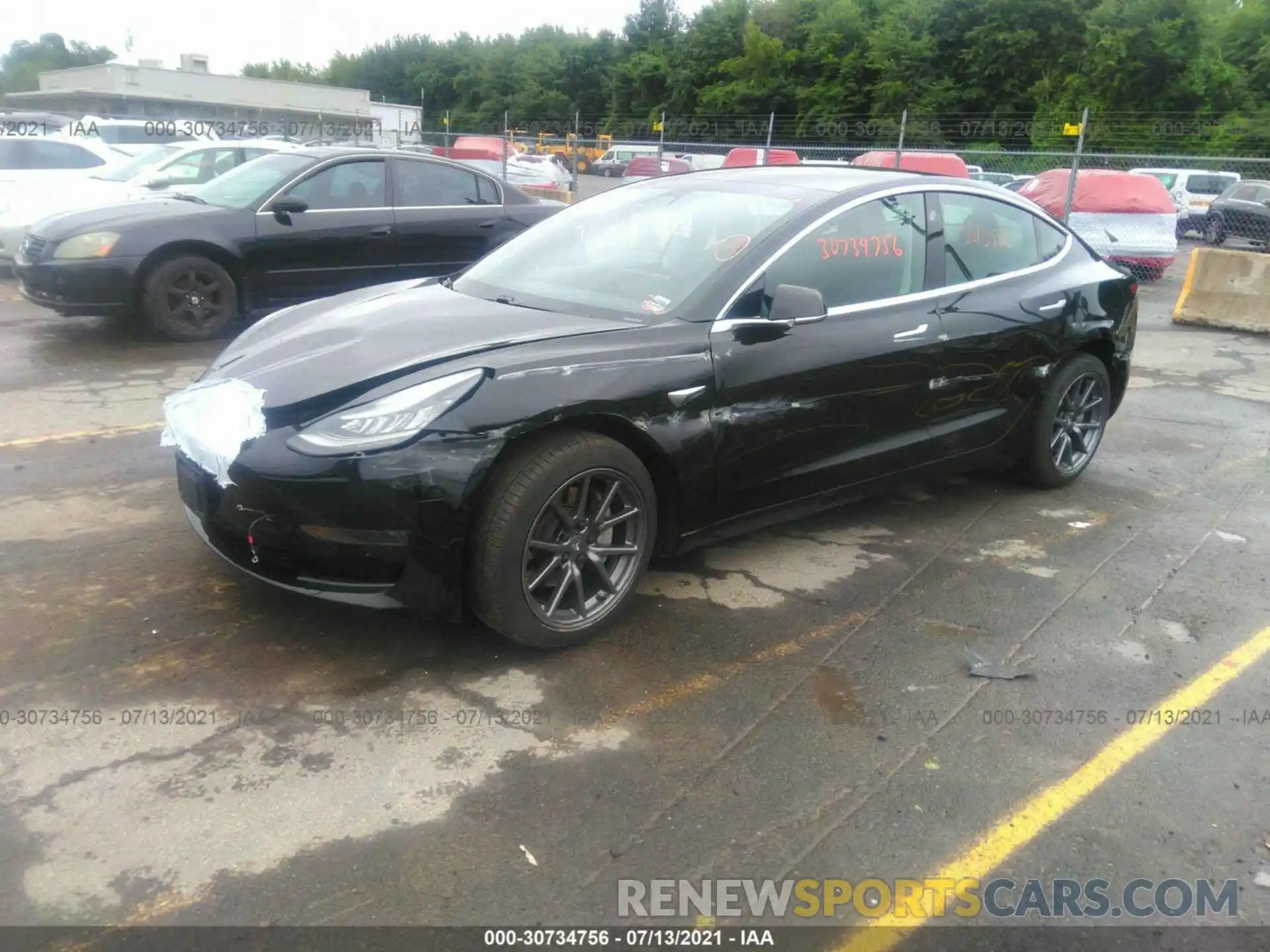 2 Photograph of a damaged car 5YJ3E1EA0LF657456 TESLA MODEL 3 2020