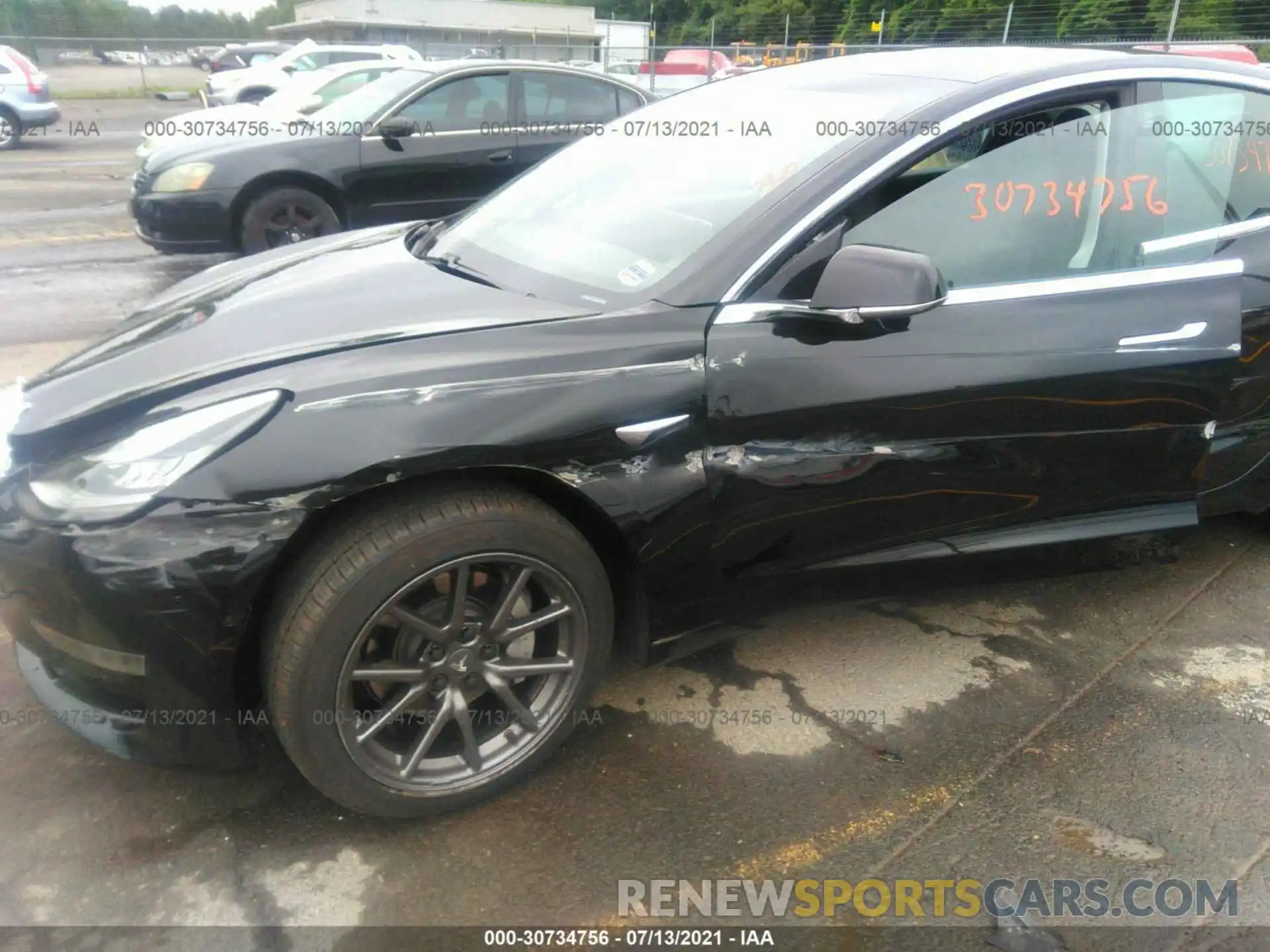 6 Photograph of a damaged car 5YJ3E1EA0LF657456 TESLA MODEL 3 2020