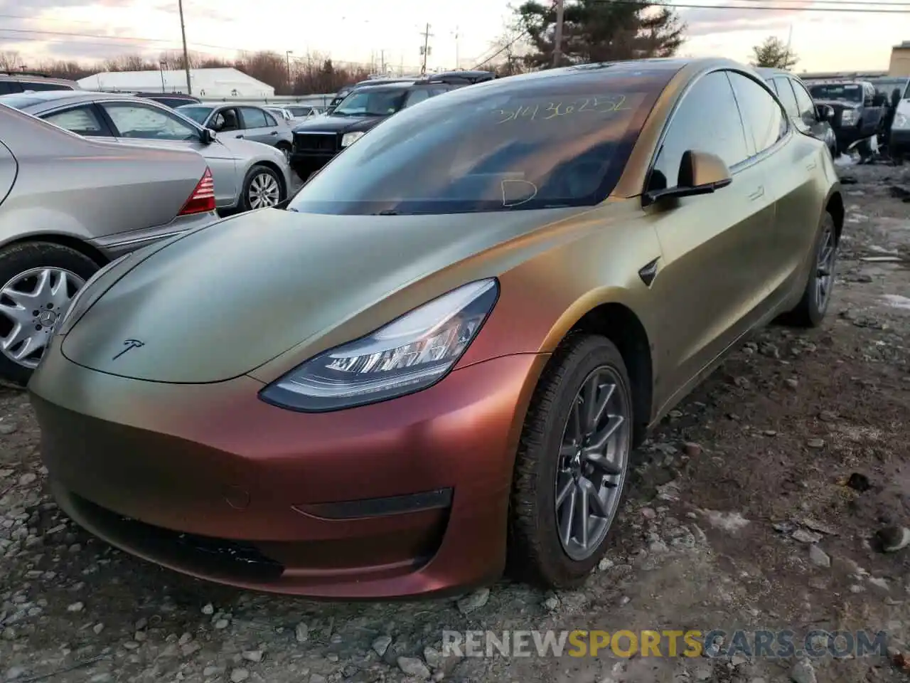 2 Photograph of a damaged car 5YJ3E1EA0LF657585 TESLA MODEL 3 2020