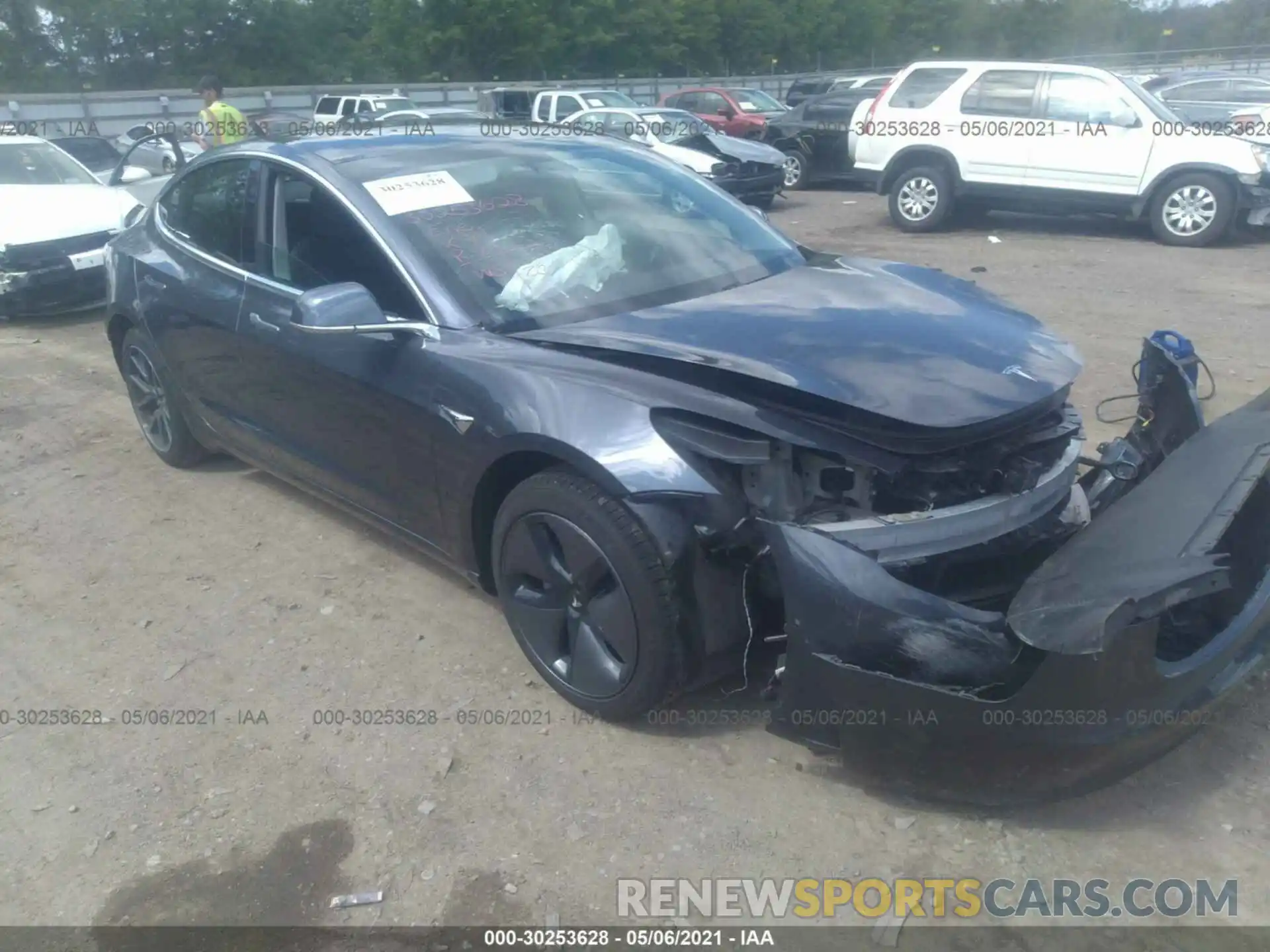 1 Photograph of a damaged car 5YJ3E1EA0LF657845 TESLA MODEL 3 2020