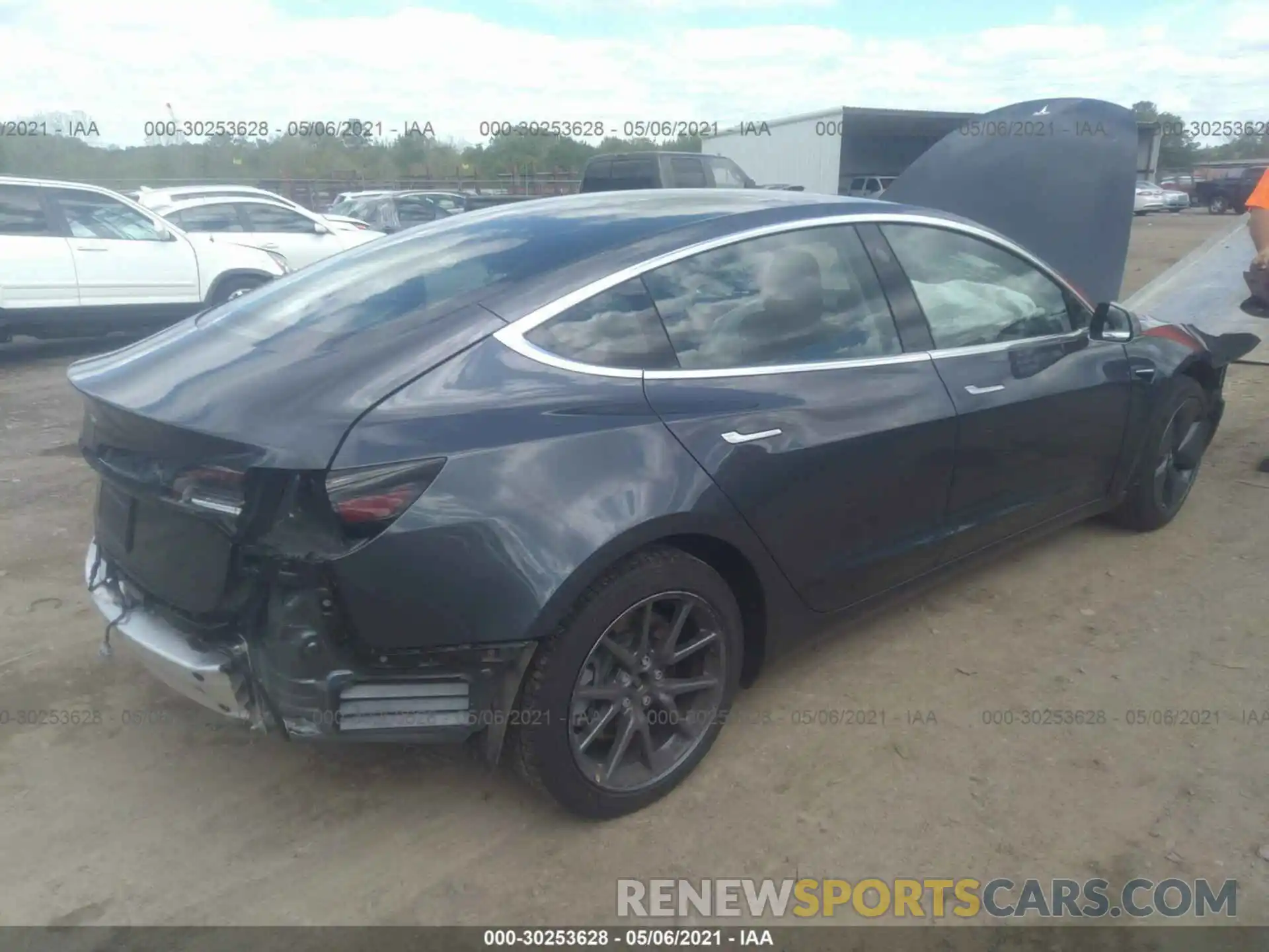 4 Photograph of a damaged car 5YJ3E1EA0LF657845 TESLA MODEL 3 2020