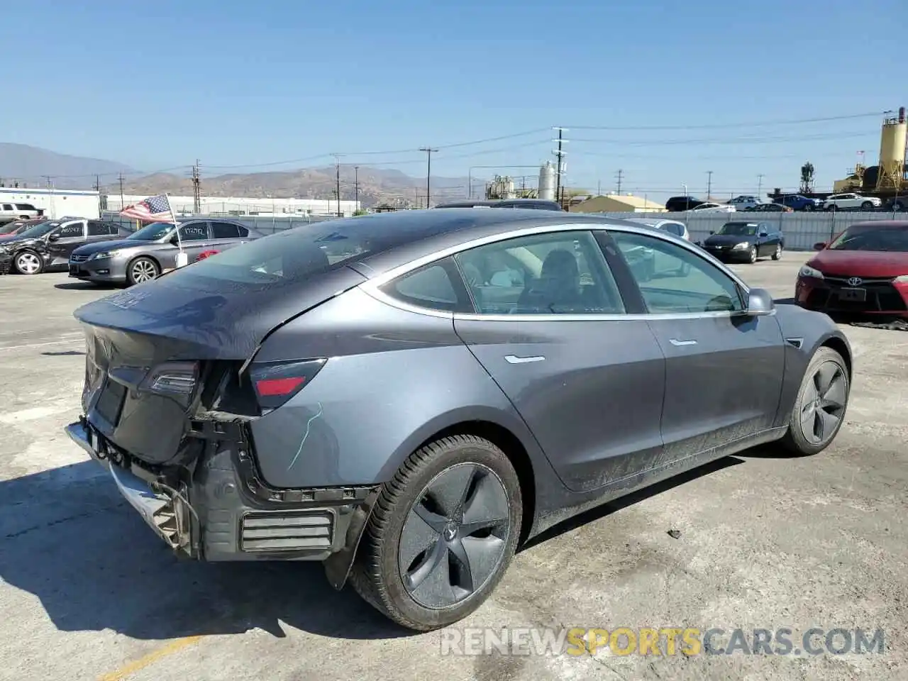 4 Photograph of a damaged car 5YJ3E1EA0LF658204 TESLA MODEL 3 2020