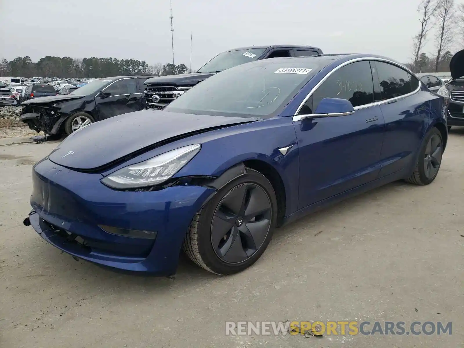 2 Photograph of a damaged car 5YJ3E1EA0LF658493 TESLA MODEL 3 2020