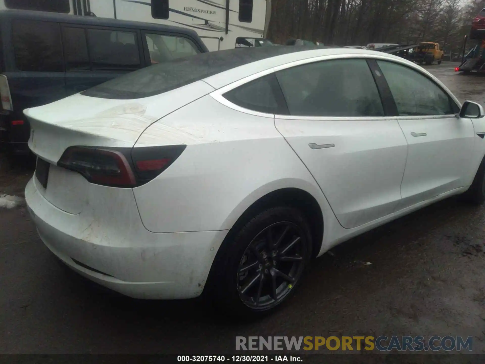 4 Photograph of a damaged car 5YJ3E1EA0LF658767 TESLA MODEL 3 2020