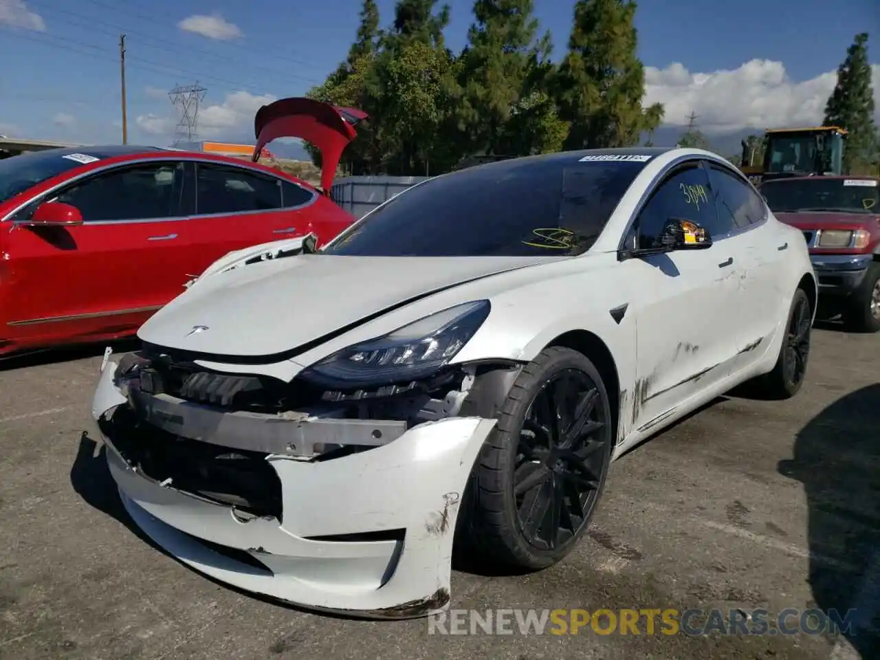 2 Photograph of a damaged car 5YJ3E1EA0LF658834 TESLA MODEL 3 2020