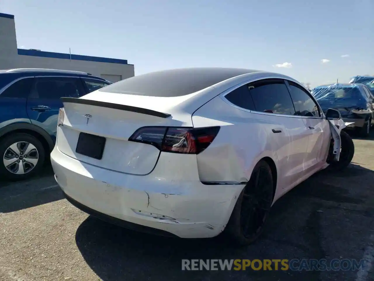 4 Photograph of a damaged car 5YJ3E1EA0LF658834 TESLA MODEL 3 2020