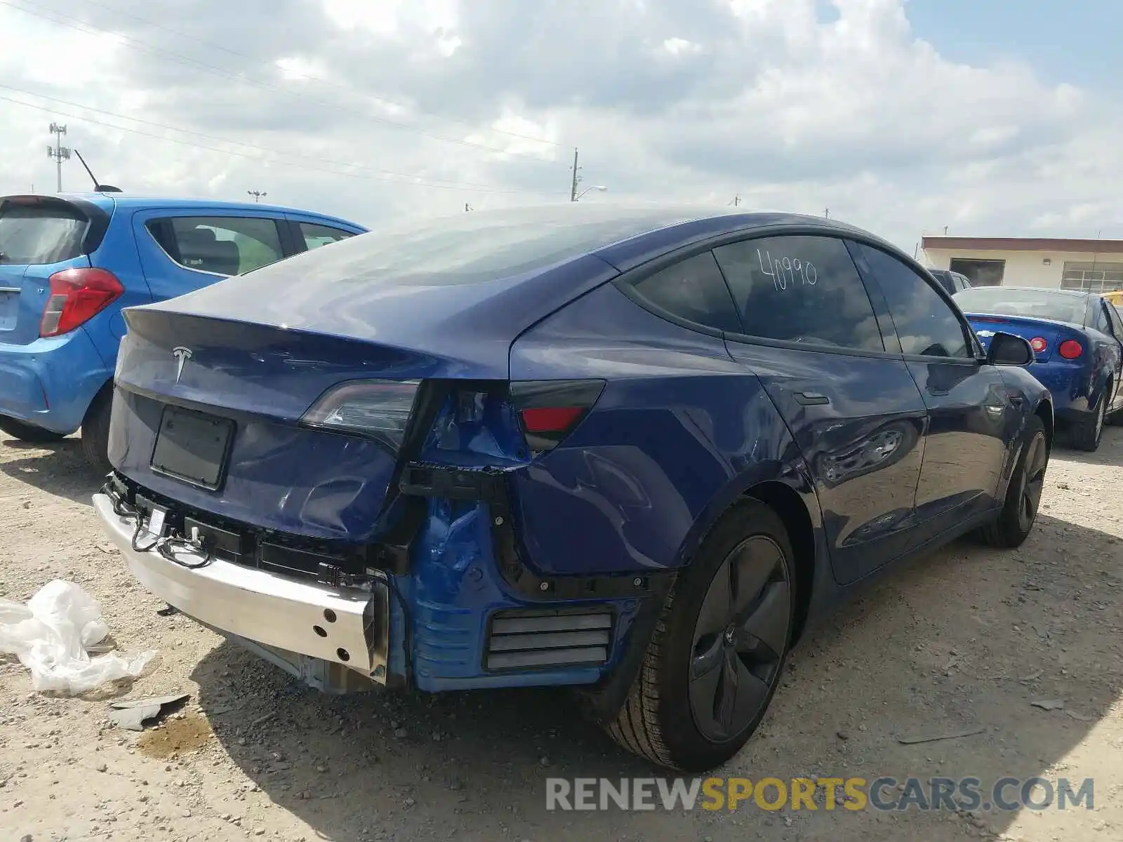 4 Photograph of a damaged car 5YJ3E1EA0LF660101 TESLA MODEL 3 2020