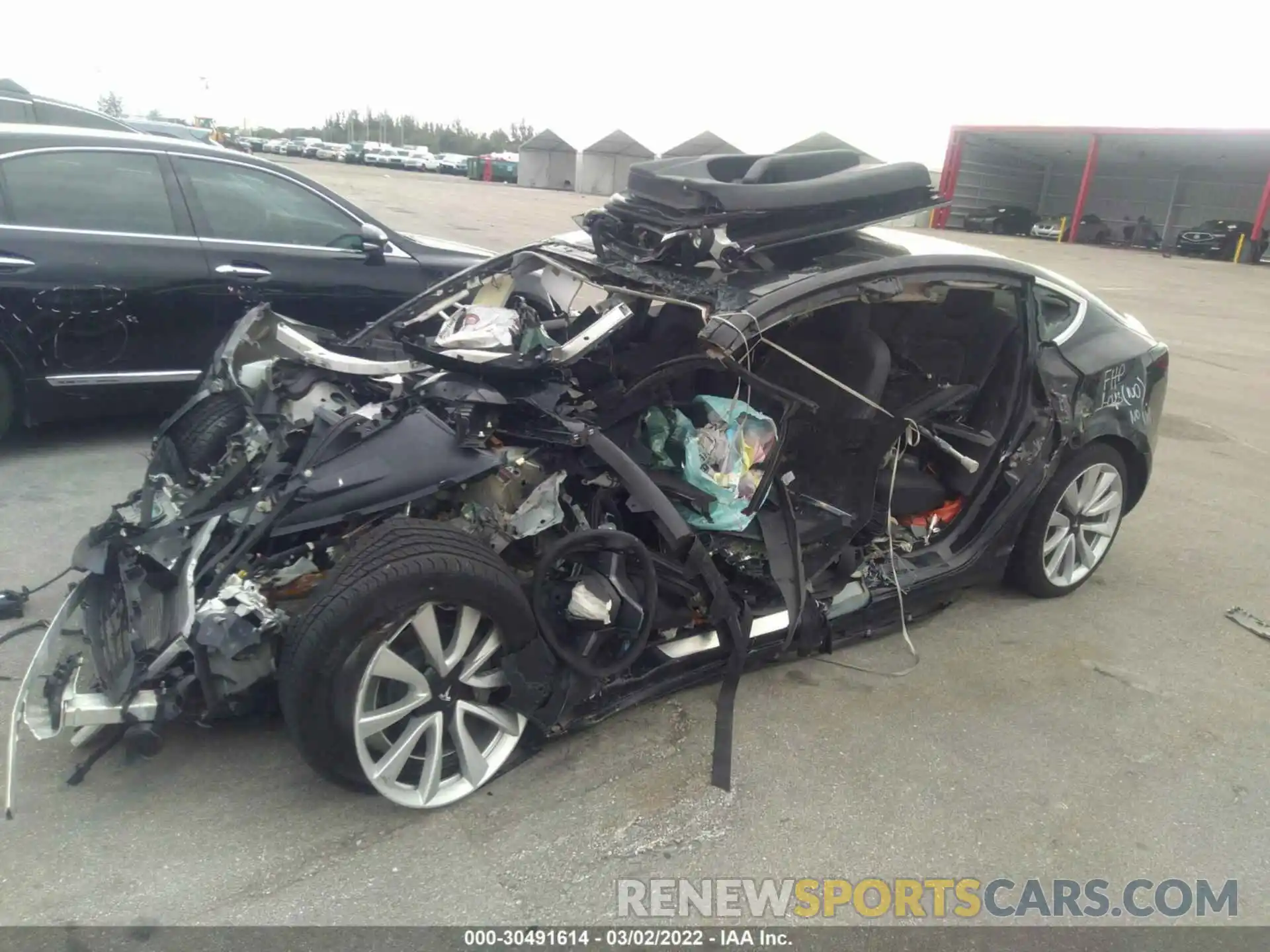 2 Photograph of a damaged car 5YJ3E1EA0LF660888 TESLA MODEL 3 2020