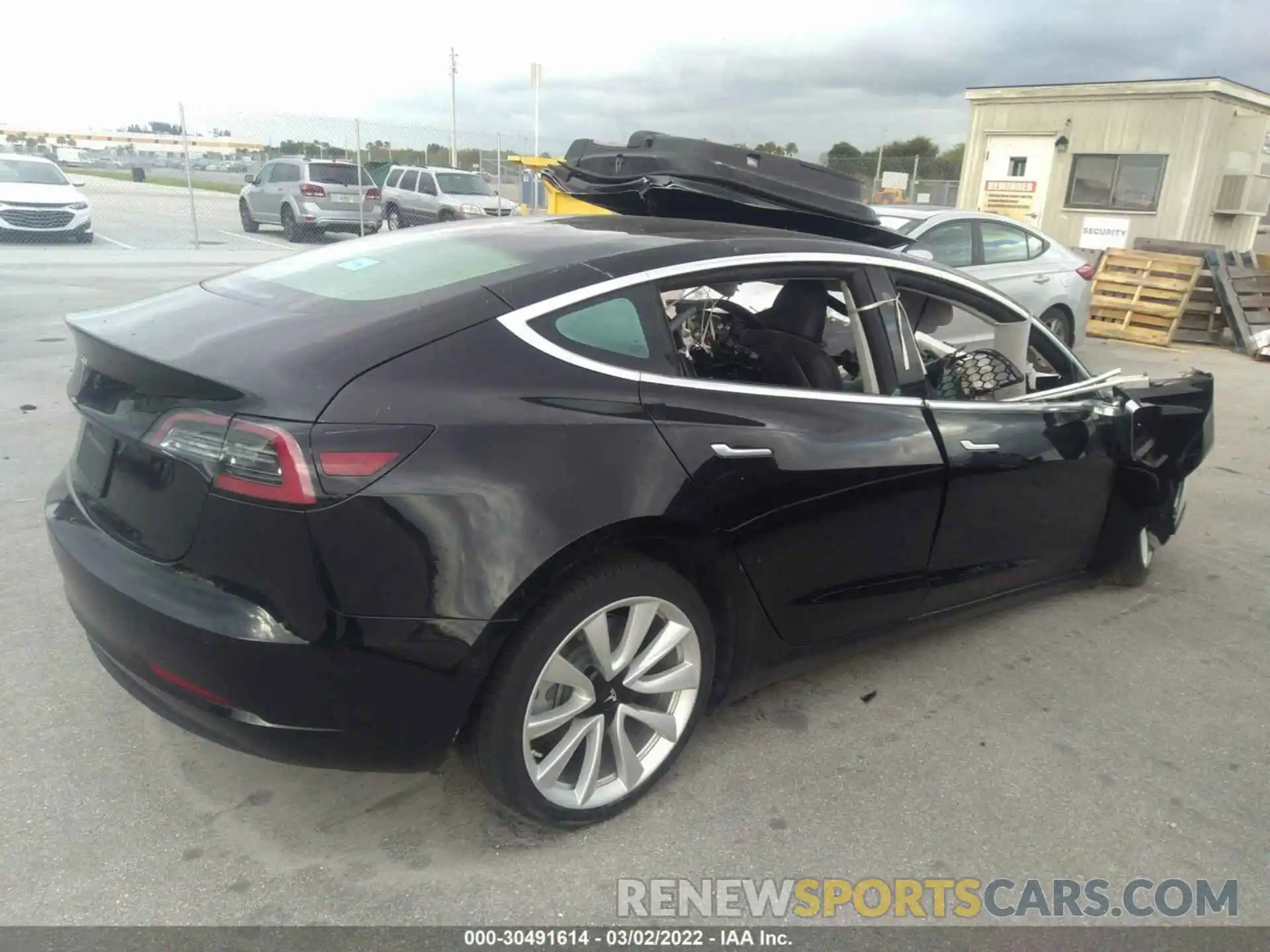 4 Photograph of a damaged car 5YJ3E1EA0LF660888 TESLA MODEL 3 2020