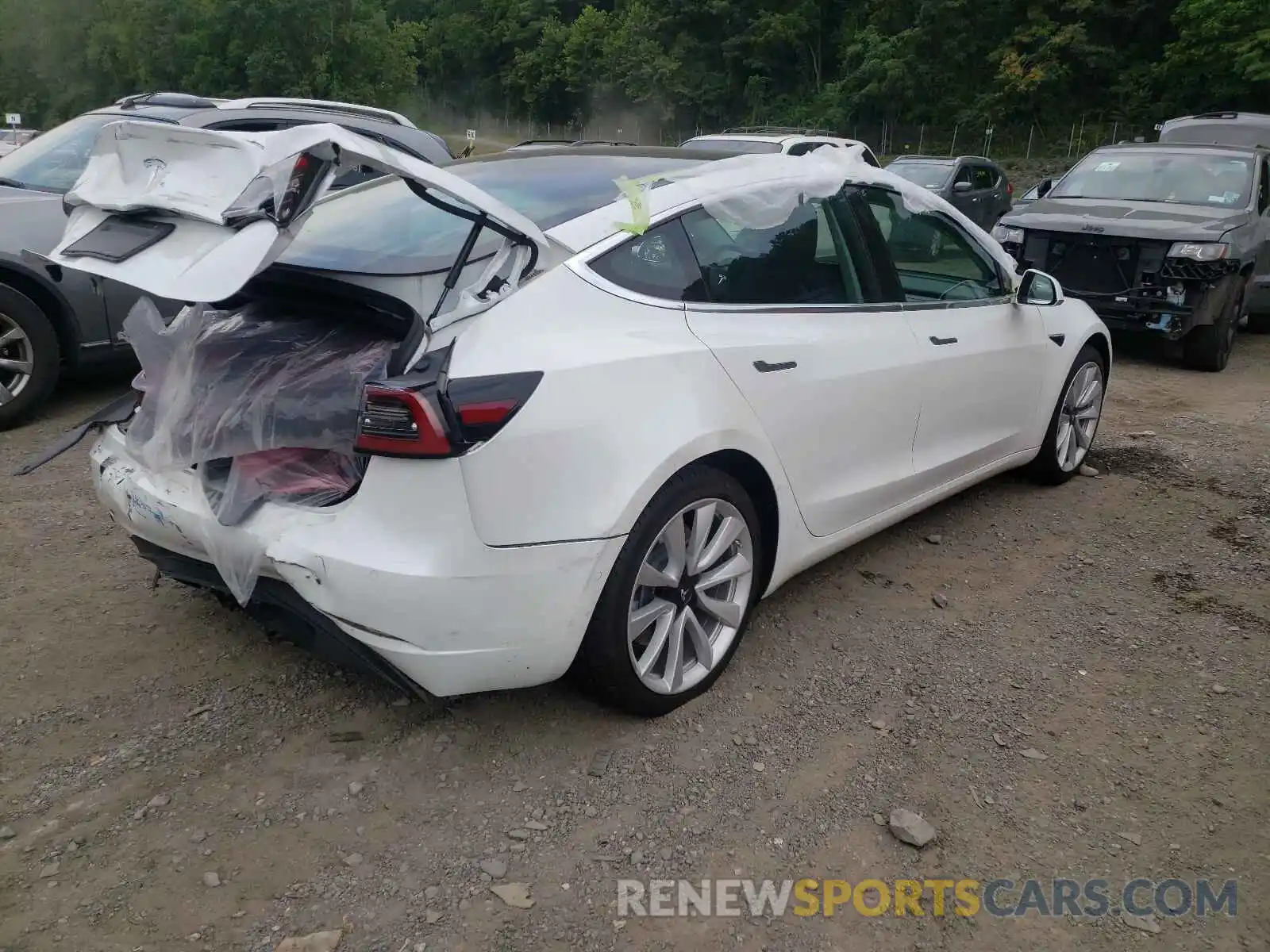 4 Photograph of a damaged car 5YJ3E1EA0LF661460 TESLA MODEL 3 2020