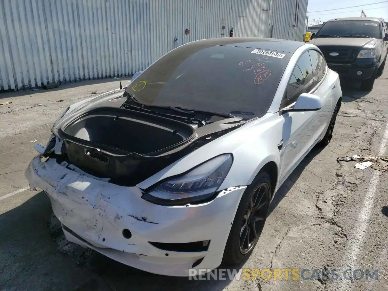 2 Photograph of a damaged car 5YJ3E1EA0LF738246 TESLA MODEL 3 2020