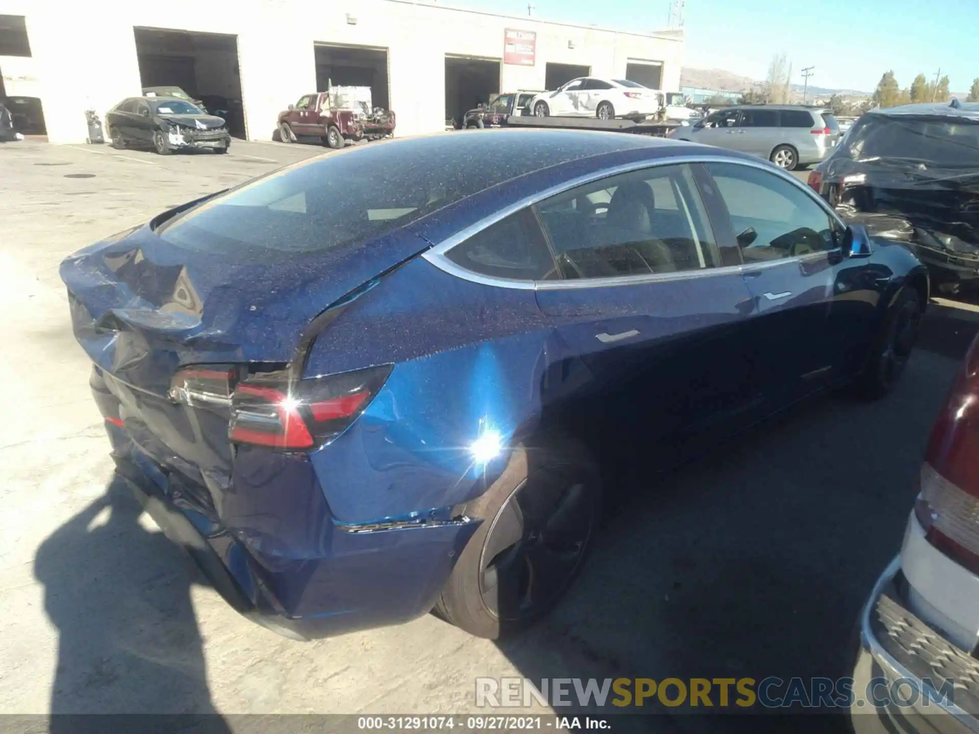 4 Photograph of a damaged car 5YJ3E1EA0LF739848 TESLA MODEL 3 2020