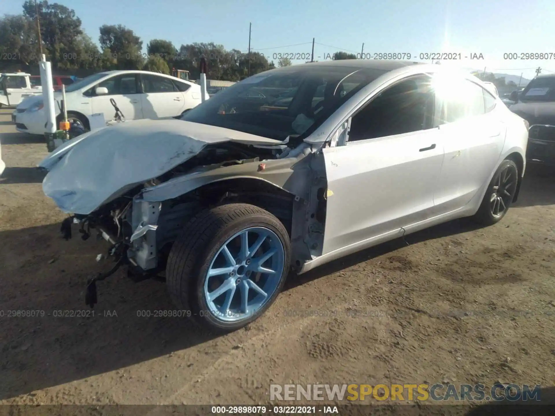 2 Photograph of a damaged car 5YJ3E1EA0LF739977 TESLA MODEL 3 2020