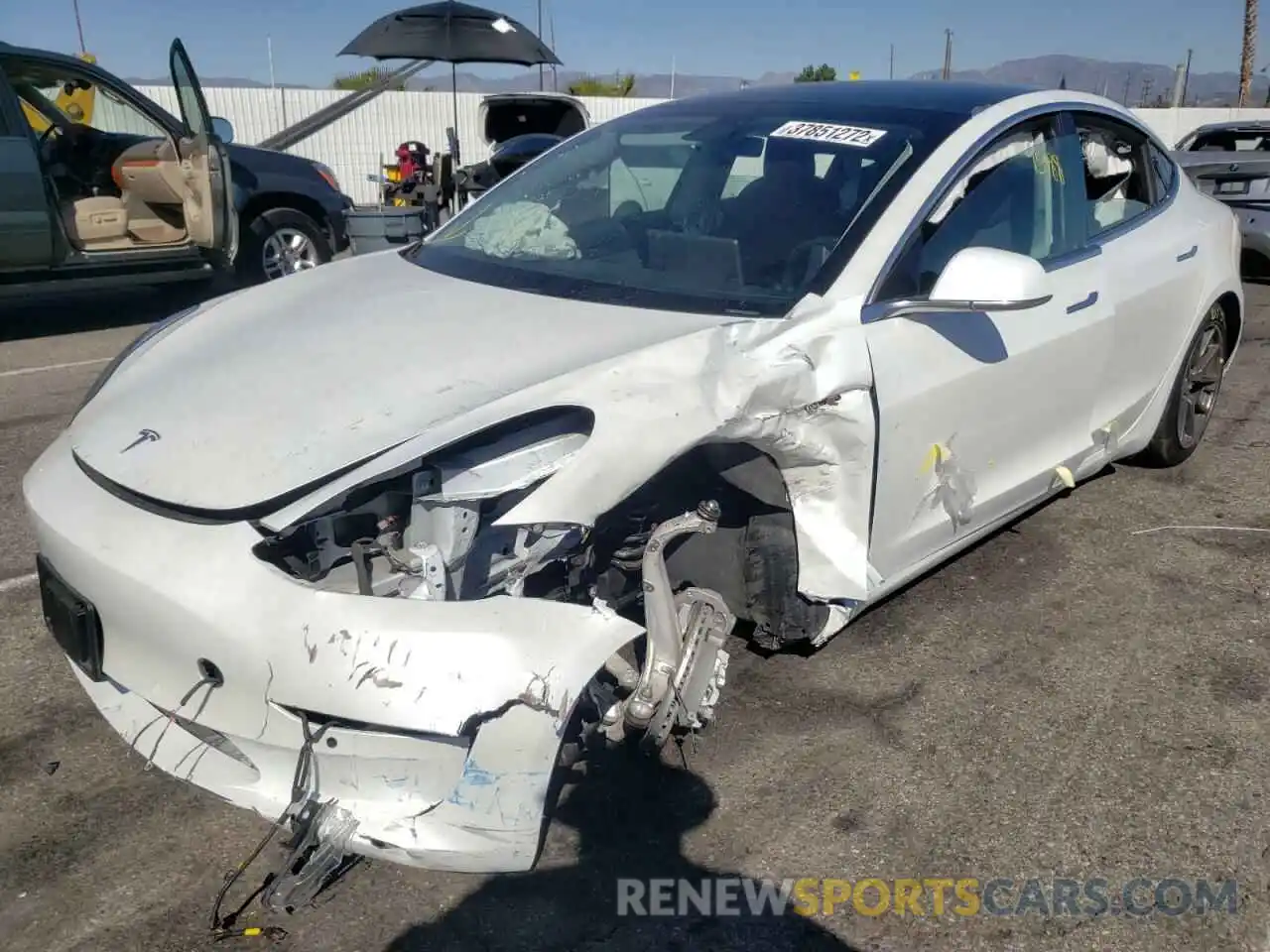 2 Photograph of a damaged car 5YJ3E1EA0LF744886 TESLA MODEL 3 2020