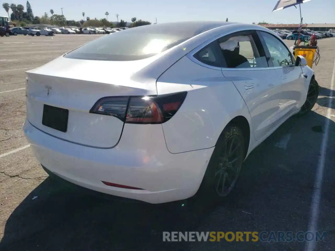 4 Photograph of a damaged car 5YJ3E1EA0LF744886 TESLA MODEL 3 2020