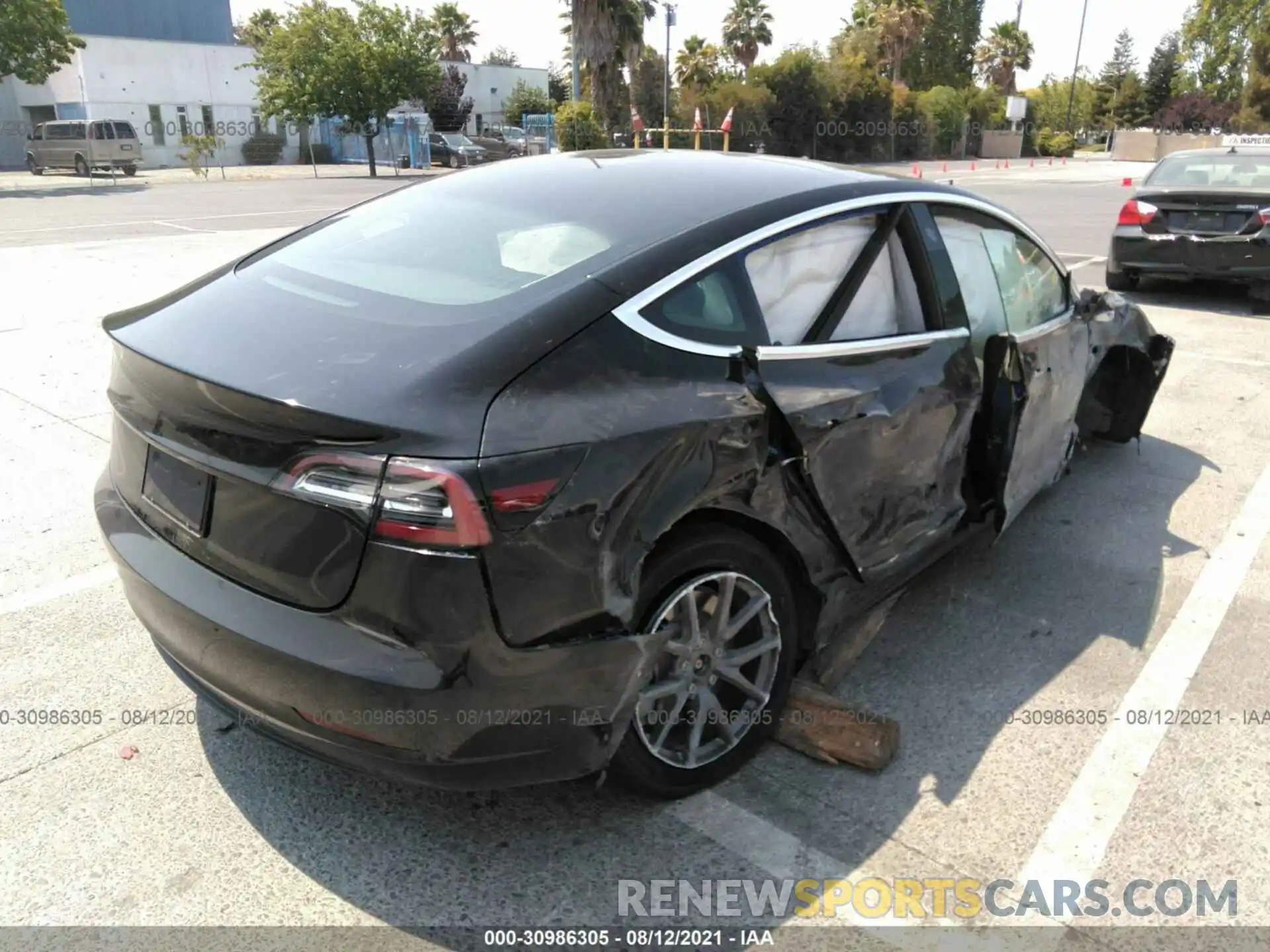 4 Photograph of a damaged car 5YJ3E1EA0LF745682 TESLA MODEL 3 2020