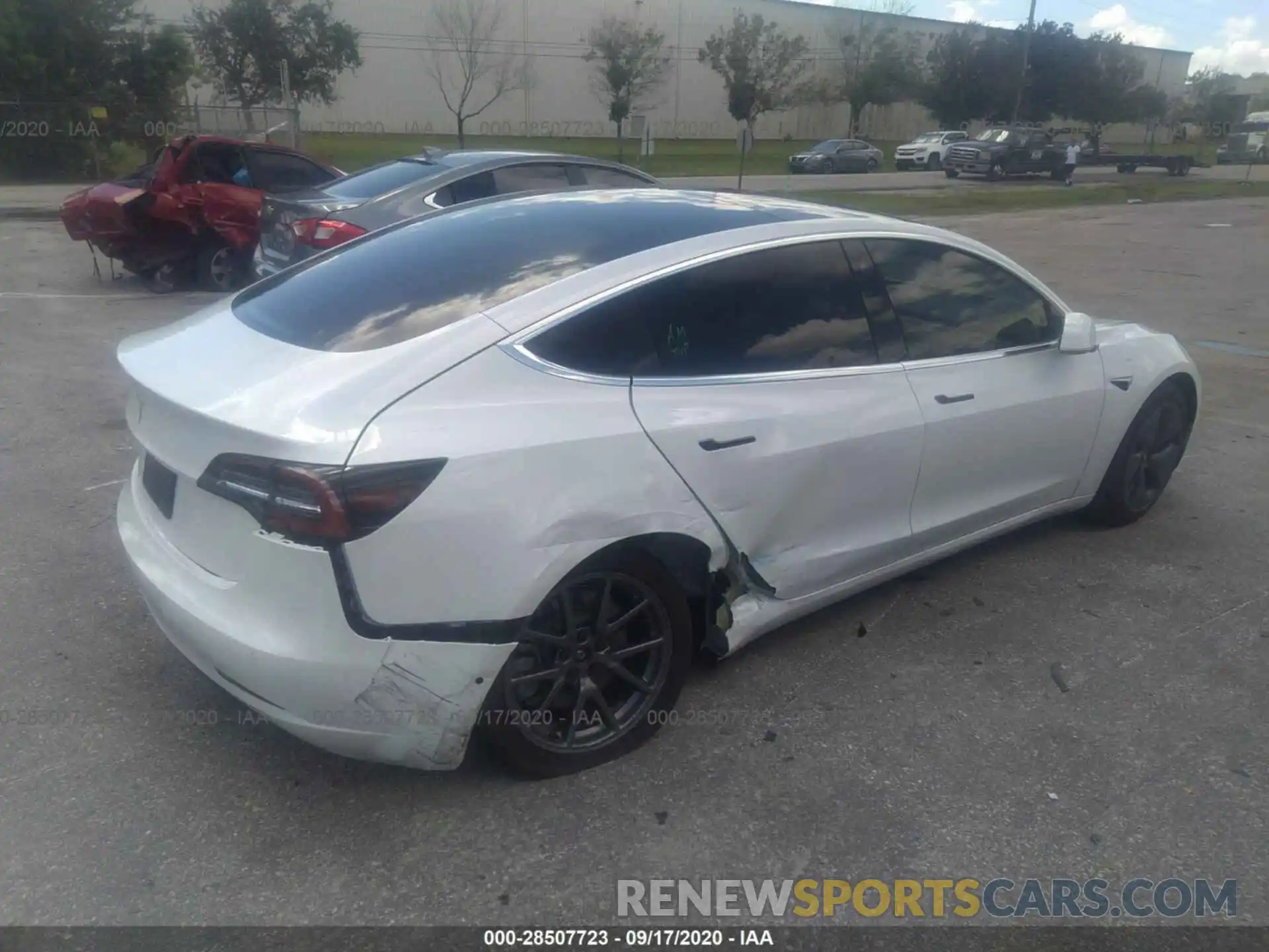 4 Photograph of a damaged car 5YJ3E1EA0LF747125 TESLA MODEL 3 2020