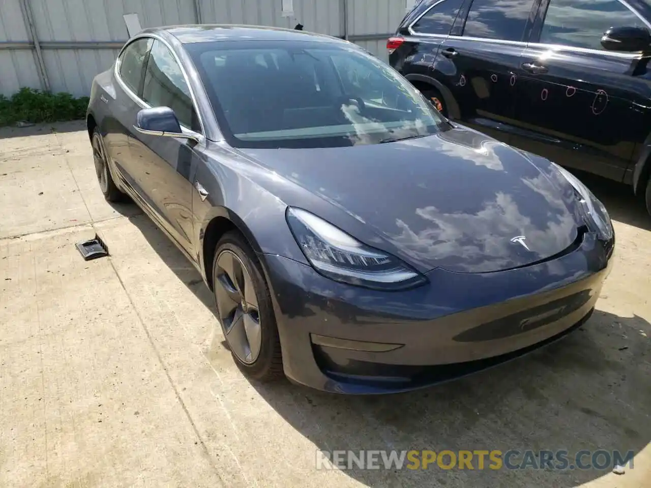 1 Photograph of a damaged car 5YJ3E1EA0LF792260 TESLA MODEL 3 2020