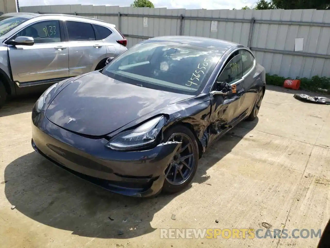 2 Photograph of a damaged car 5YJ3E1EA0LF792260 TESLA MODEL 3 2020