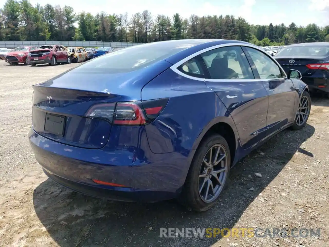 4 Photograph of a damaged car 5YJ3E1EA0LF792386 TESLA MODEL 3 2020