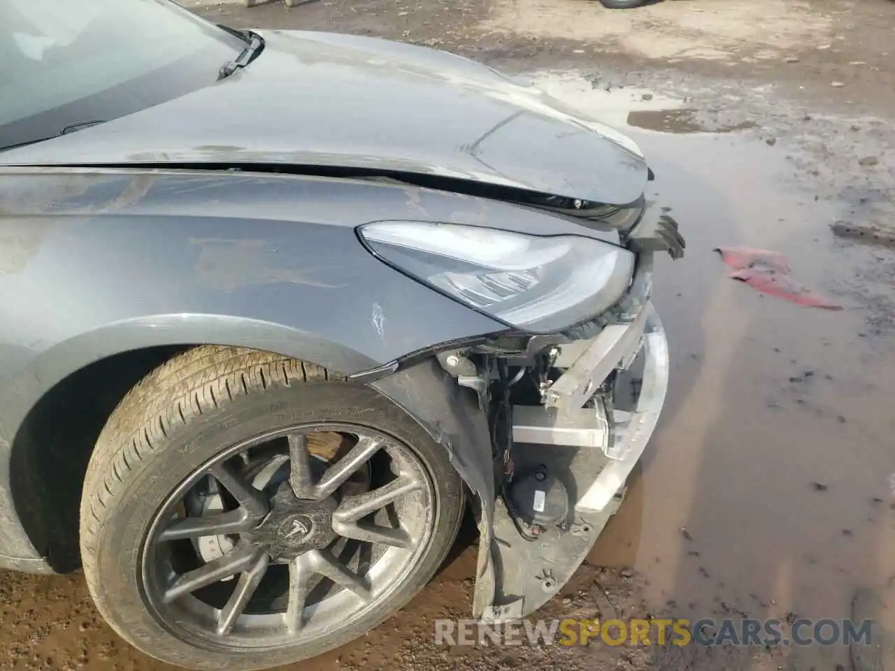 9 Photograph of a damaged car 5YJ3E1EA0LF797667 TESLA MODEL 3 2020