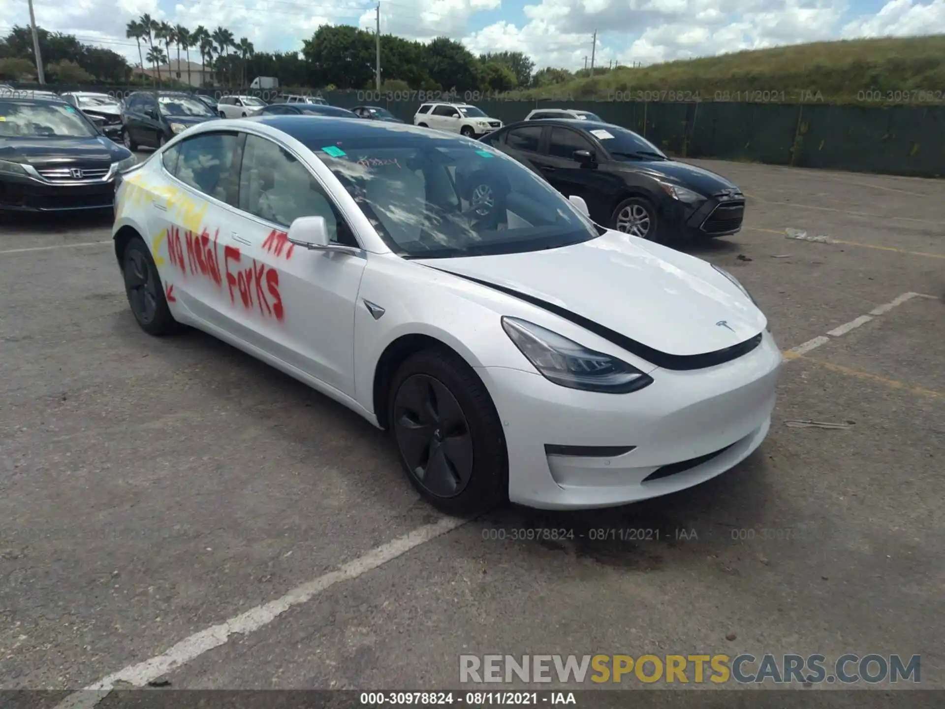 1 Photograph of a damaged car 5YJ3E1EA0LF797863 TESLA MODEL 3 2020