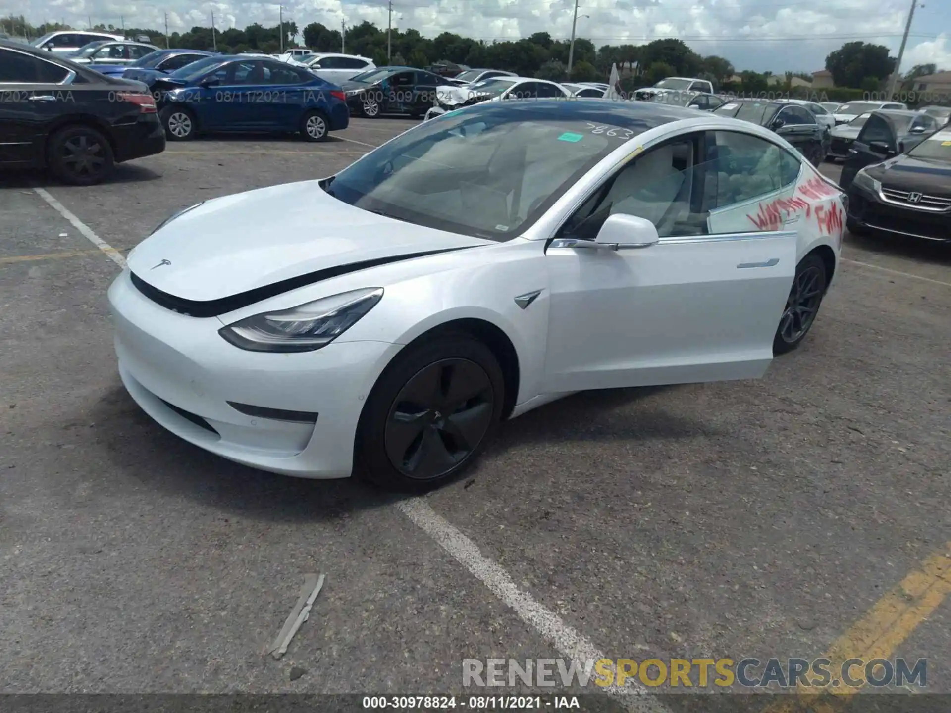 2 Photograph of a damaged car 5YJ3E1EA0LF797863 TESLA MODEL 3 2020