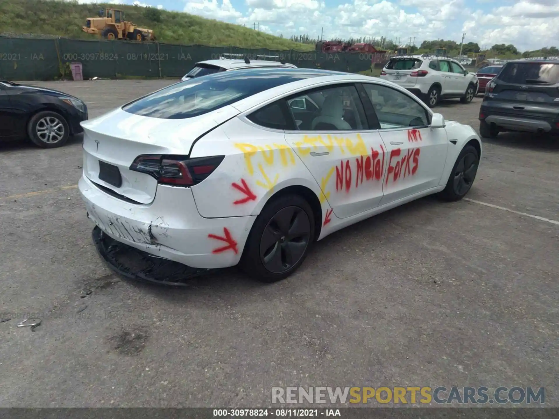 4 Photograph of a damaged car 5YJ3E1EA0LF797863 TESLA MODEL 3 2020