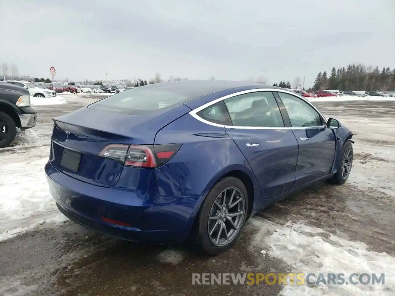 4 Photograph of a damaged car 5YJ3E1EA0LF798513 TESLA MODEL 3 2020