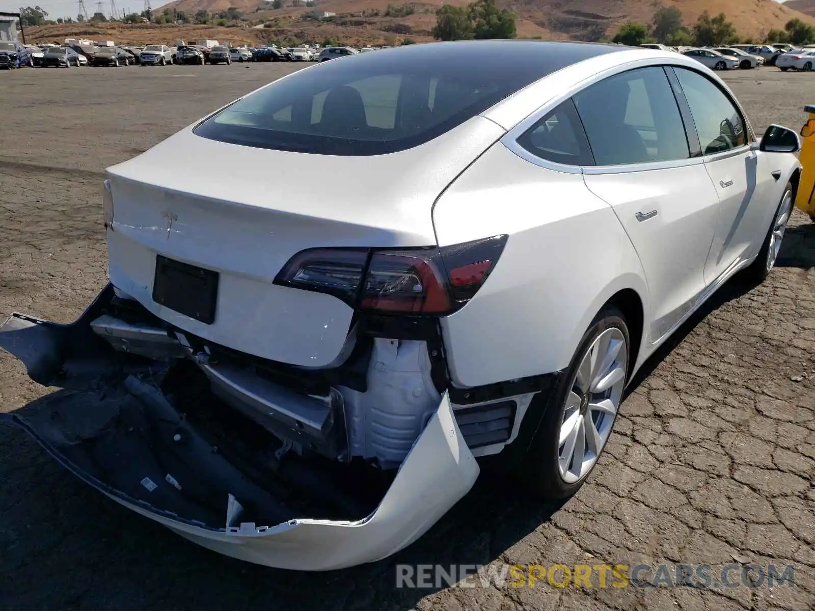 4 Photograph of a damaged car 5YJ3E1EA0LF802396 TESLA MODEL 3 2020