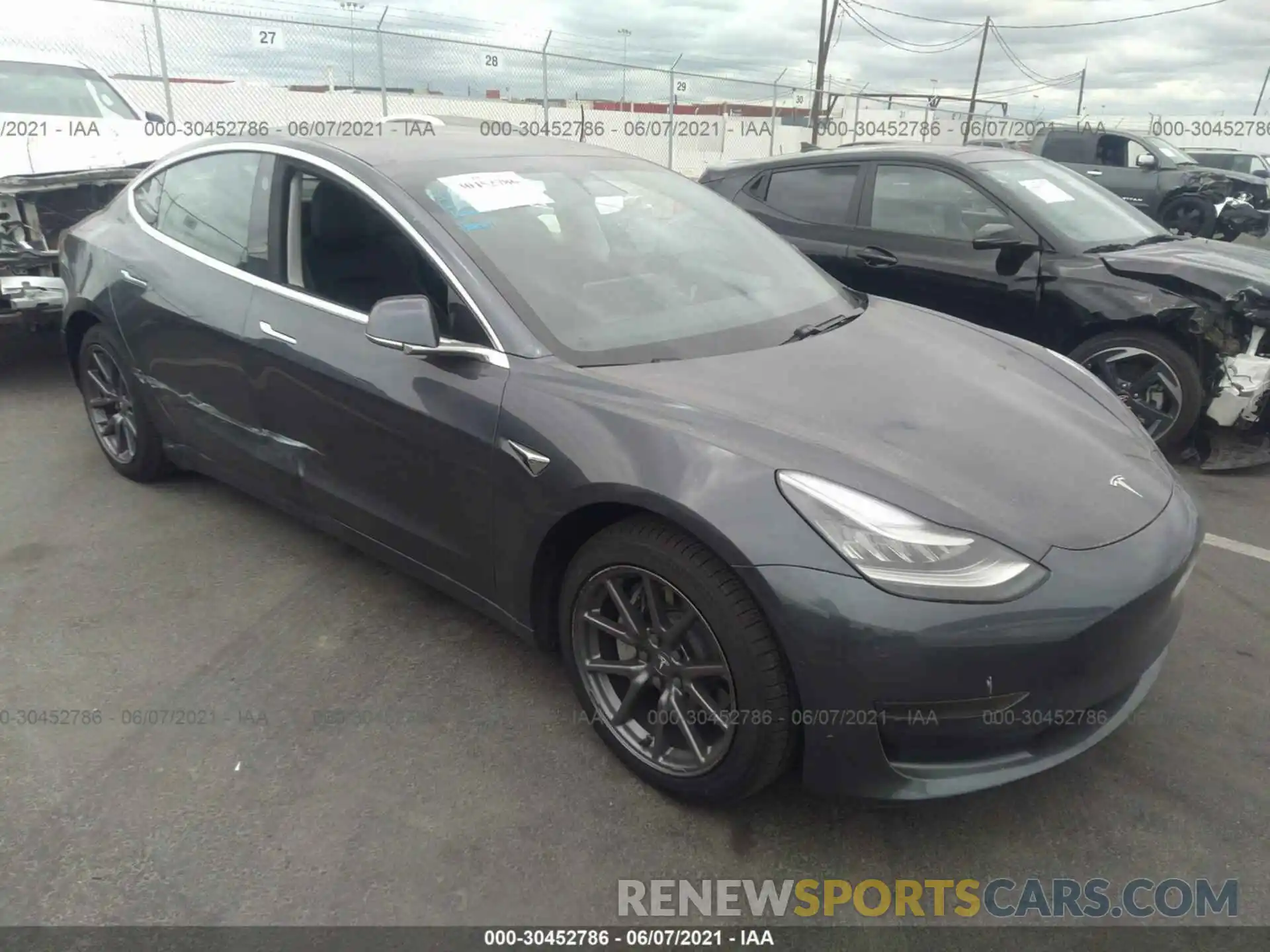 1 Photograph of a damaged car 5YJ3E1EA0LF803595 TESLA MODEL 3 2020