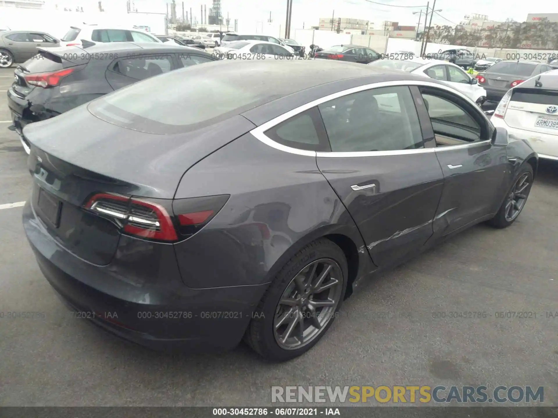 4 Photograph of a damaged car 5YJ3E1EA0LF803595 TESLA MODEL 3 2020