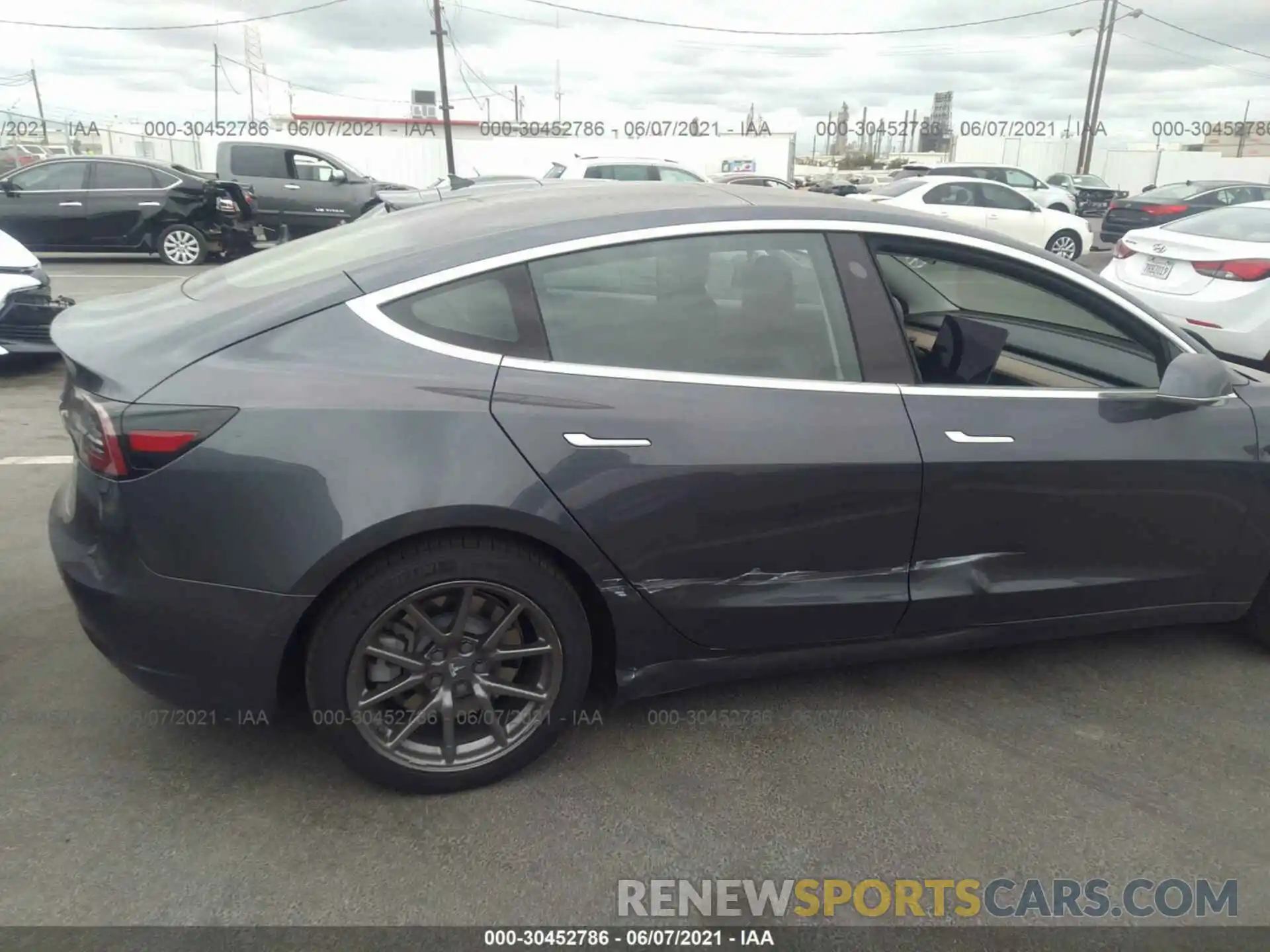 6 Photograph of a damaged car 5YJ3E1EA0LF803595 TESLA MODEL 3 2020