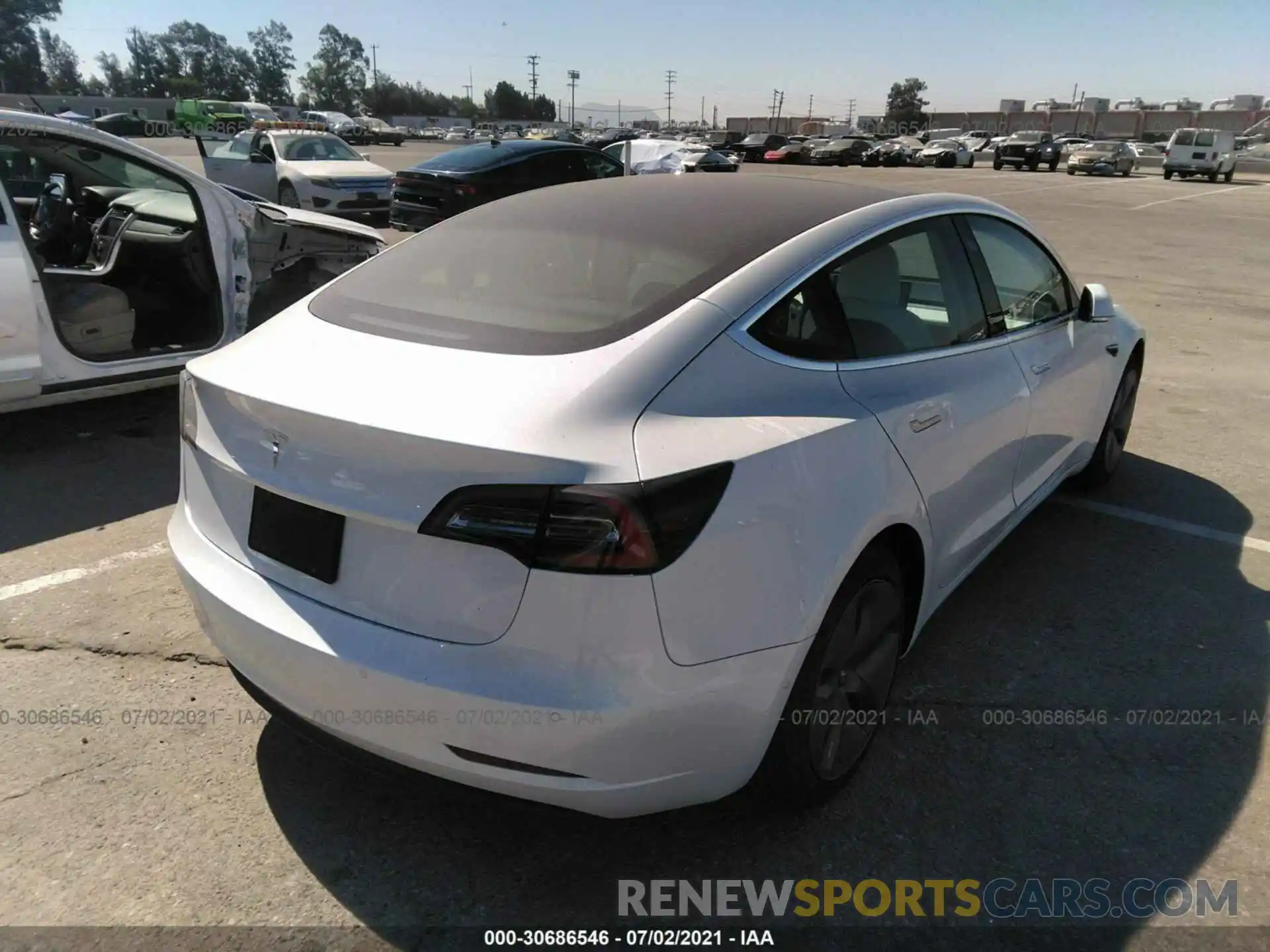 4 Photograph of a damaged car 5YJ3E1EA0LF805184 TESLA MODEL 3 2020