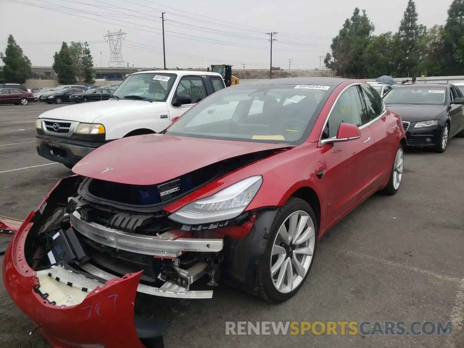 2 Photograph of a damaged car 5YJ3E1EA0LF808036 TESLA MODEL 3 2020