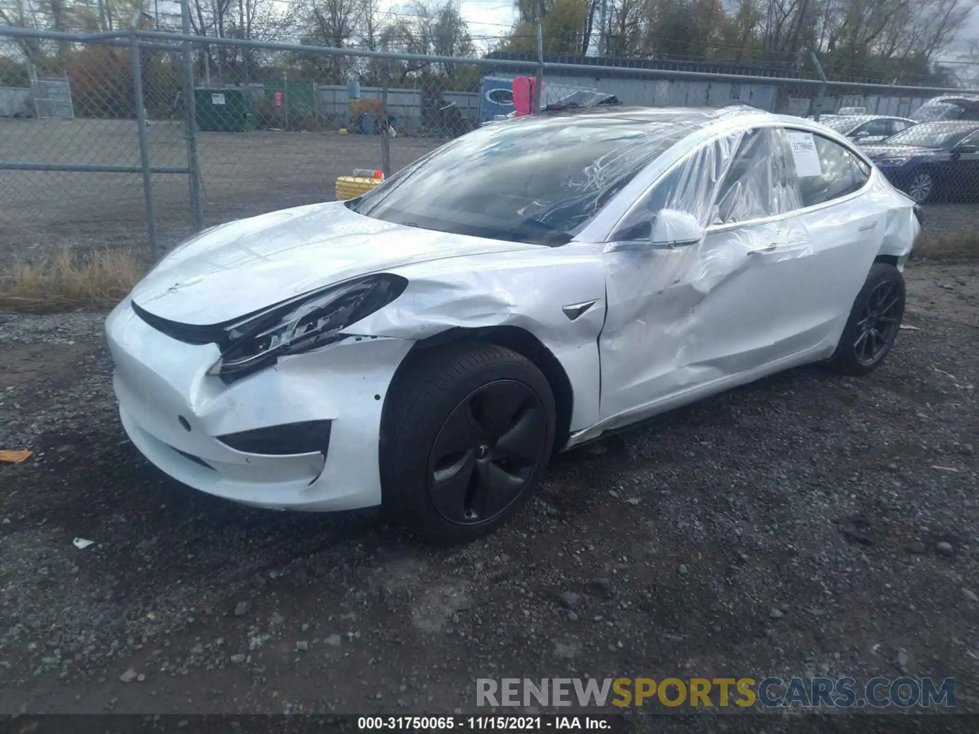 2 Photograph of a damaged car 5YJ3E1EA0LF808599 TESLA MODEL 3 2020