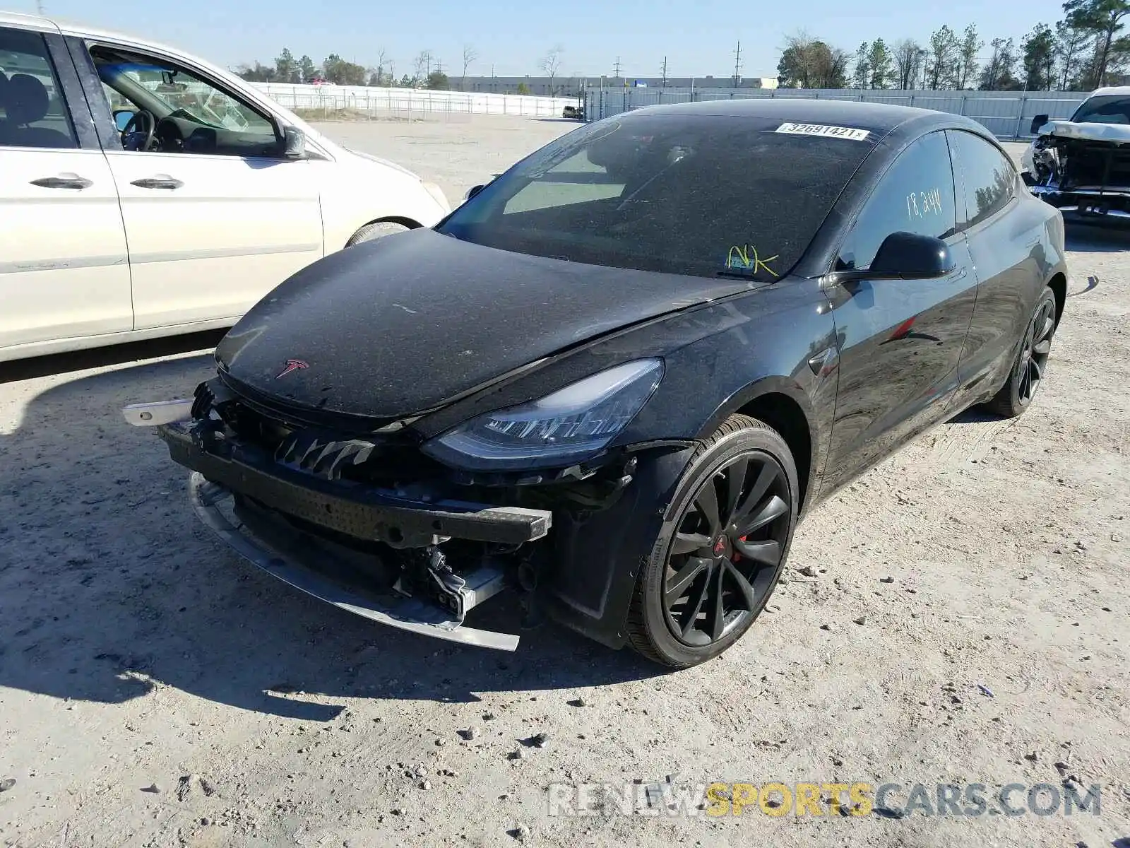 2 Photograph of a damaged car 5YJ3E1EA1LF519828 TESLA MODEL 3 2020