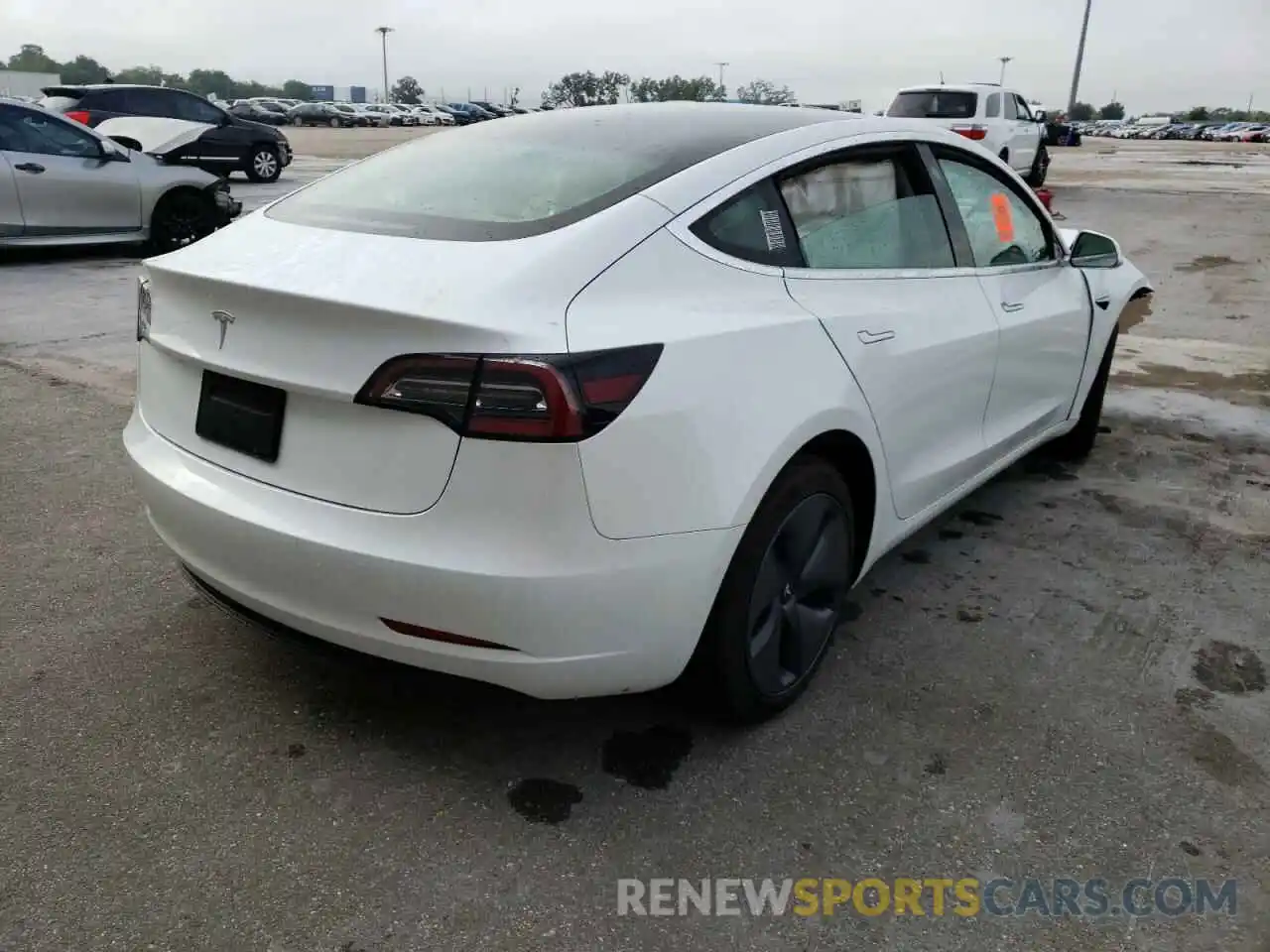 4 Photograph of a damaged car 5YJ3E1EA1LF599213 TESLA MODEL 3 2020