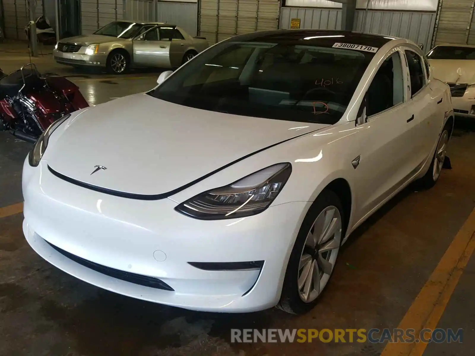 2 Photograph of a damaged car 5YJ3E1EA1LF614471 TESLA MODEL 3 2020