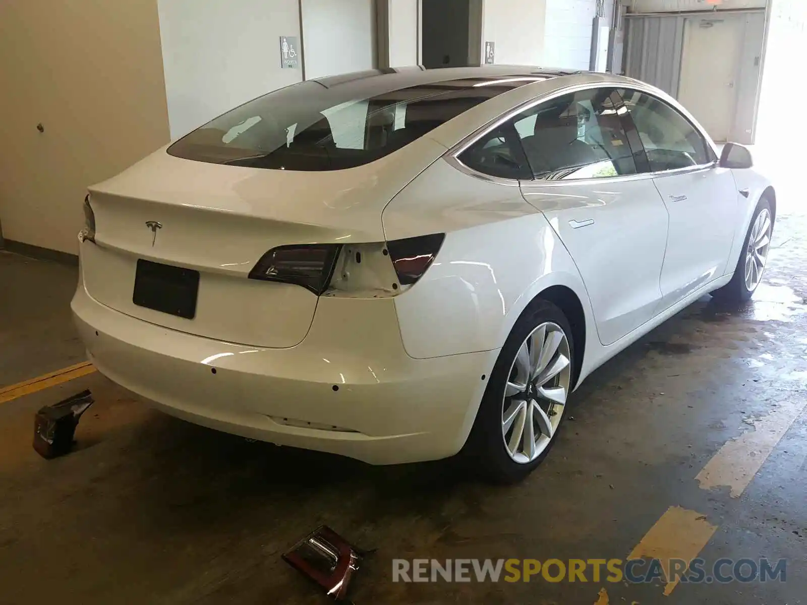 4 Photograph of a damaged car 5YJ3E1EA1LF614471 TESLA MODEL 3 2020