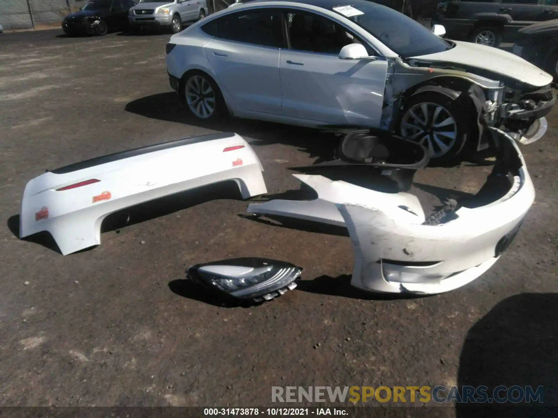 12 Photograph of a damaged car 5YJ3E1EA1LF634249 TESLA MODEL 3 2020