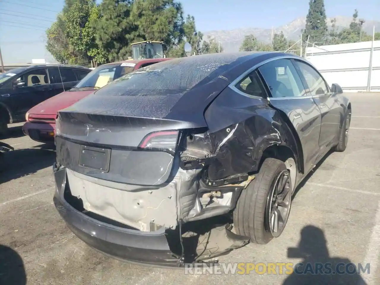 4 Photograph of a damaged car 5YJ3E1EA1LF657840 TESLA MODEL 3 2020