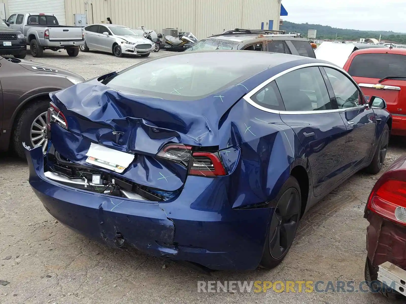 4 Photograph of a damaged car 5YJ3E1EA1LF658406 TESLA MODEL 3 2020