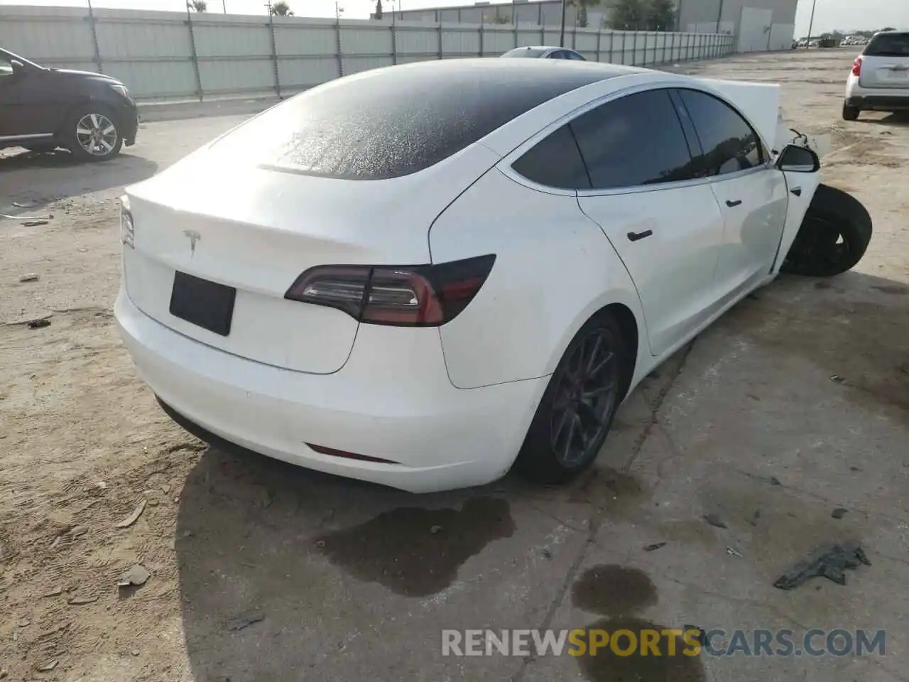 4 Photograph of a damaged car 5YJ3E1EA1LF658938 TESLA MODEL 3 2020